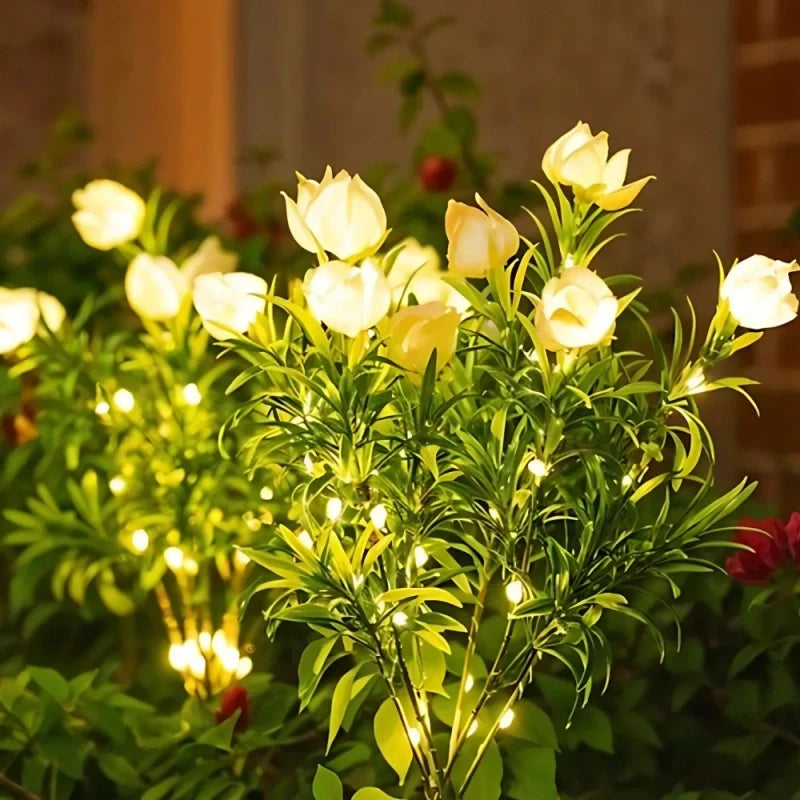 Solar flower lights with realistic blooms in warm and cool white colors for garden decoration 12