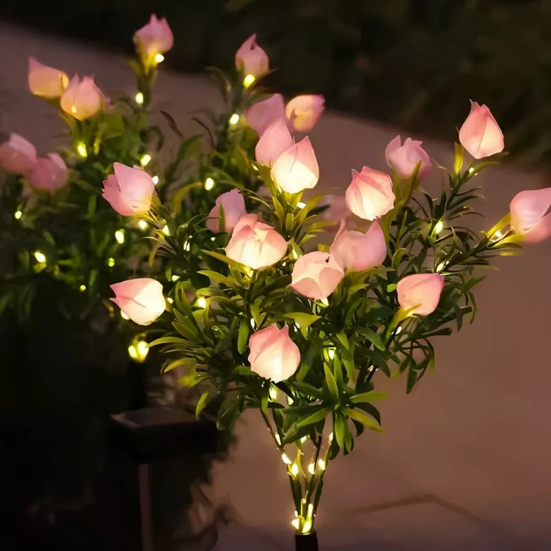 Solar flower lights with realistic blooms in warm and cool white colors for garden decoration 13