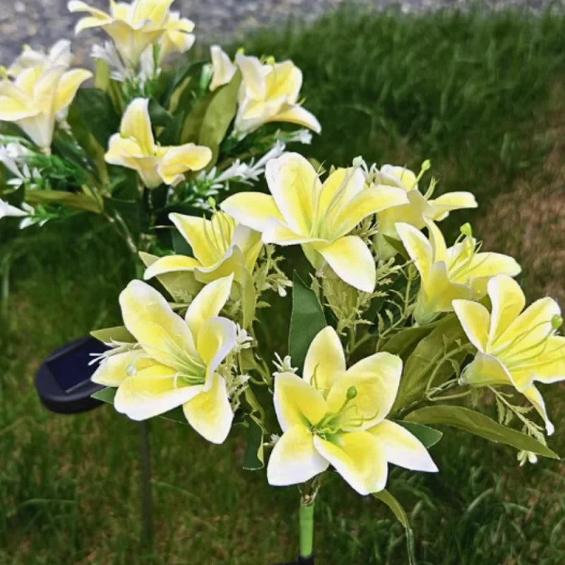 Solar flower lights with realistic blooms in warm and cool white colors for garden decoration 24