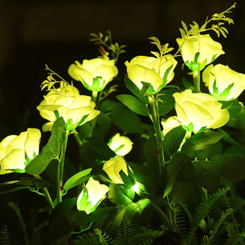 Solar flower lights with realistic blooms in warm and cool white colors for garden decoration 26