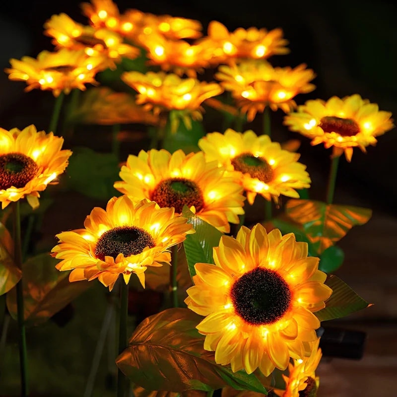 Solar flower lights with realistic blooms in warm and cool white colors for garden decoration 27