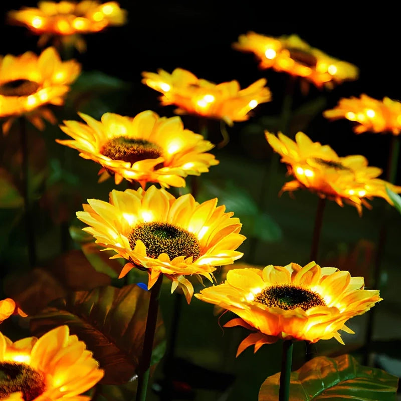 Solar flower lights with realistic blooms in warm and cool white colors for garden decoration 28