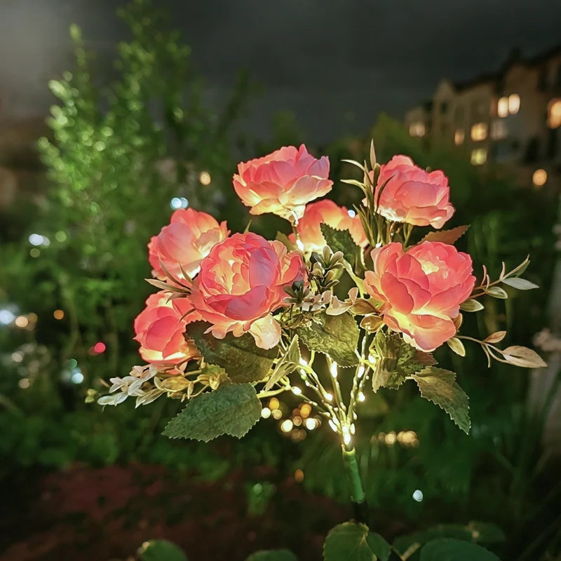 Solar flower lights with realistic blooms in warm and cool white colors for garden decoration 29