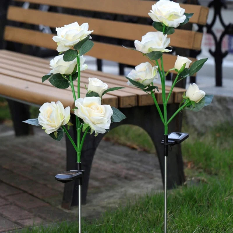 Solar flower lights with realistic blooms in warm and cool white colors for garden decoration 38