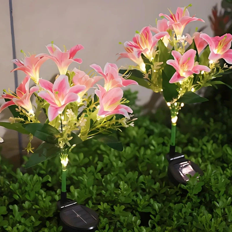 Solar flower lights with realistic blooms in warm and cool white colors for garden decoration 5