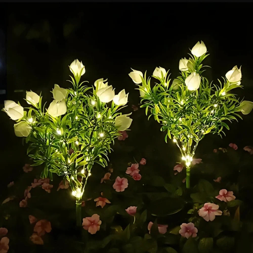 Solar flower lights with realistic blooms in warm and cool white colors for garden decoration 6