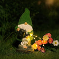 Set of 6 solar-powered garden gnomes with warm LED glow and automatic dusk sensor, weatherproof resin outdoor decoration 2