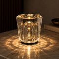 Crystal-cut USB rechargeable table lamp for bars and cafes.