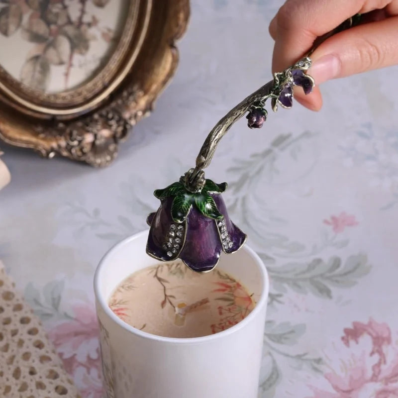 Vintage floral candle snuffer with porcelain-inspired detailing and gold-toned enamel accents 10