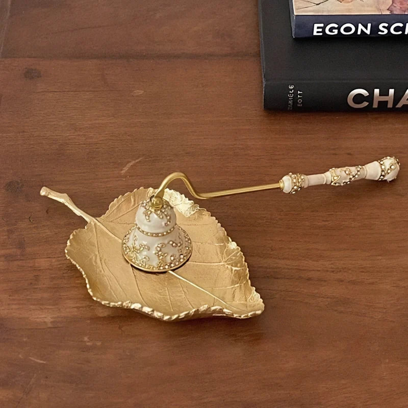 Vintage floral candle snuffer with porcelain-inspired detailing and gold-toned enamel accents 14