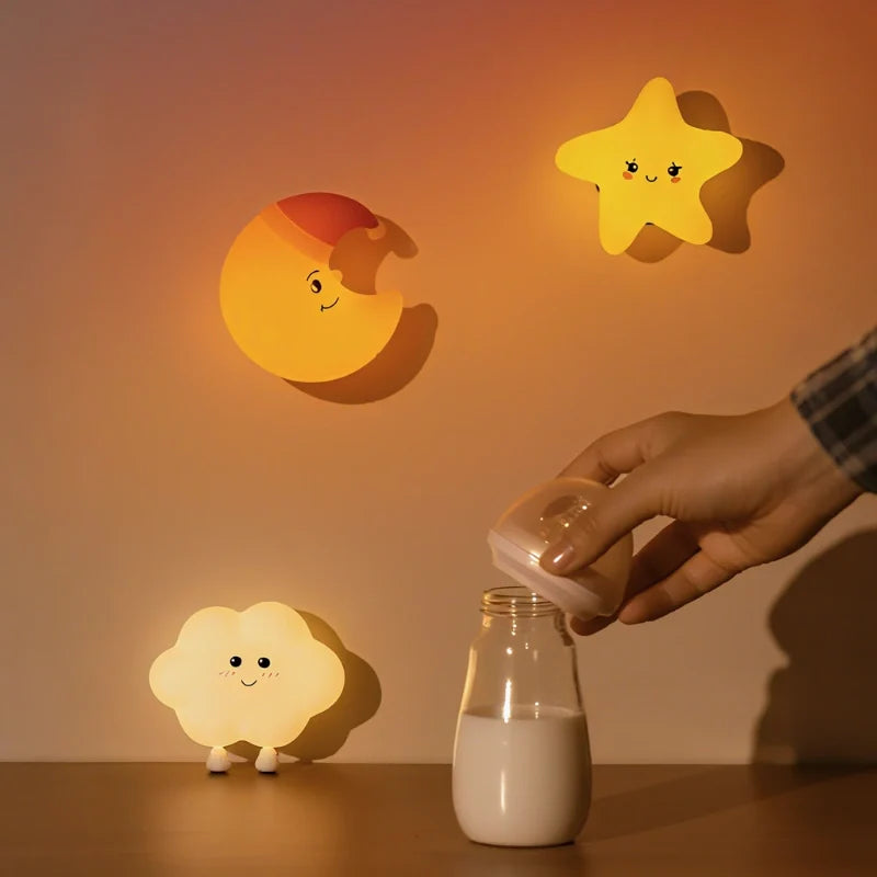 Whimsical DreamBuddies rechargeable night light in moon, star, and cloud shapes with warm white glow 10