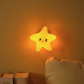 Whimsical DreamBuddies rechargeable night light in moon, star, and cloud shapes with warm white glow 2