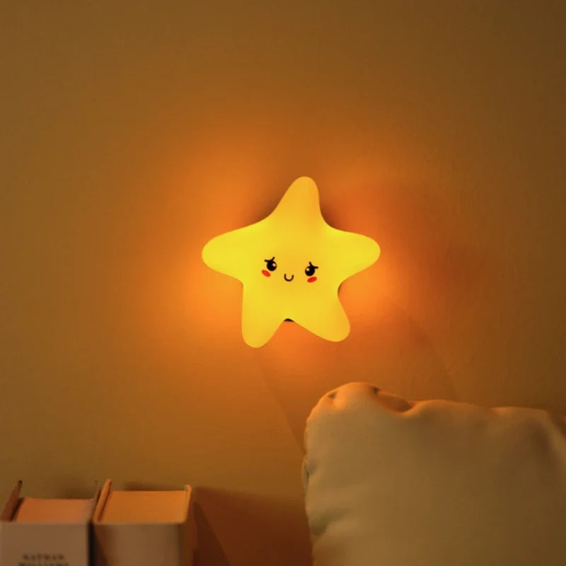 Whimsical DreamBuddies rechargeable night light in moon, star, and cloud shapes with warm white glow 2