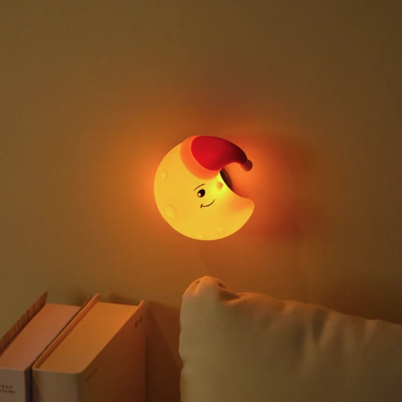 Whimsical DreamBuddies rechargeable night light in moon, star, and cloud shapes with warm white glow 3