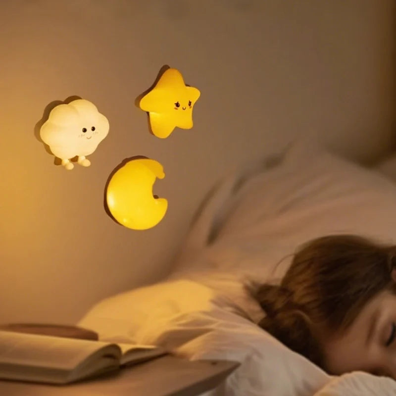 Whimsical DreamBuddies rechargeable night light in moon, star, and cloud shapes with warm white glow 8