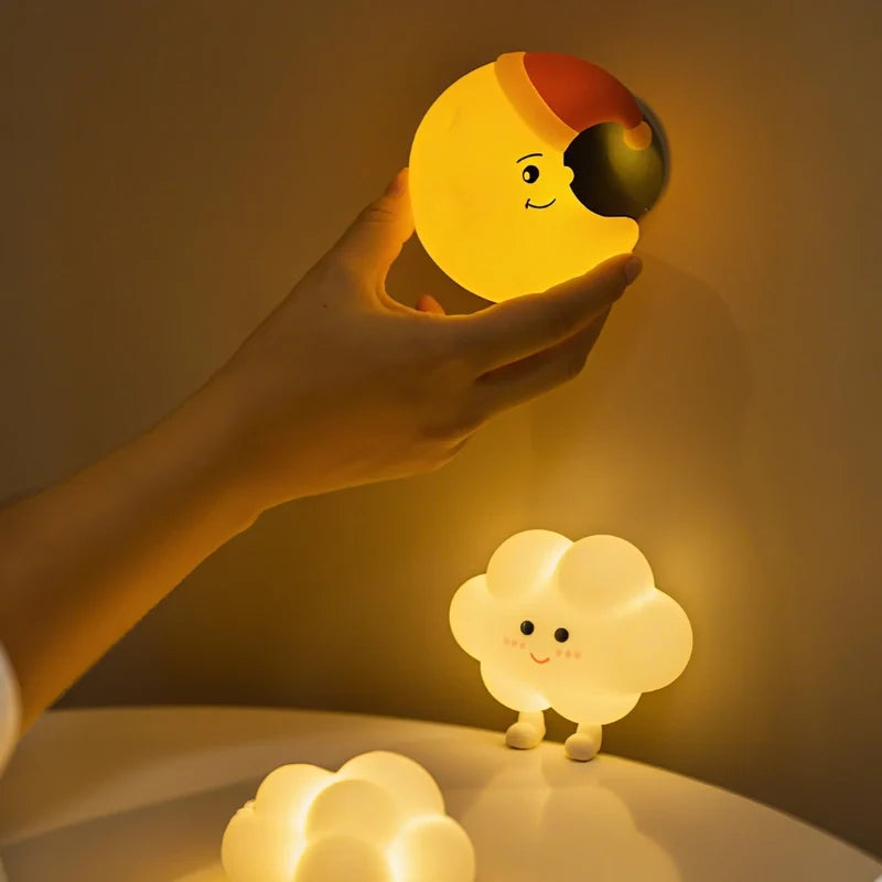 Whimsical DreamBuddies rechargeable night light in moon, star, and cloud shapes with warm white glow 9